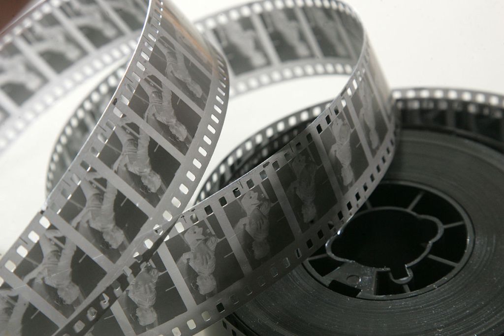A strip of film negative — each frame is a discrete moment, and the illusion of motion emerges from their rapid sequence